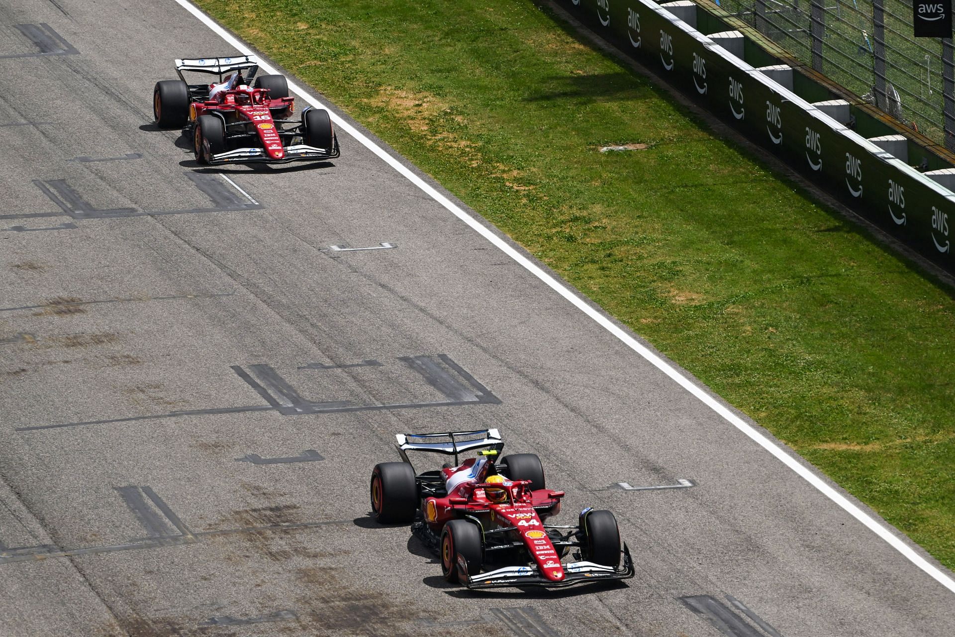Lewis Hamilton of Great Britain driving the (44) Scuderia Ferrari SF-25 leads Charles Leclerc of Monaco driving the (16) Scuderia Ferrari SF-25 - Source: Getty